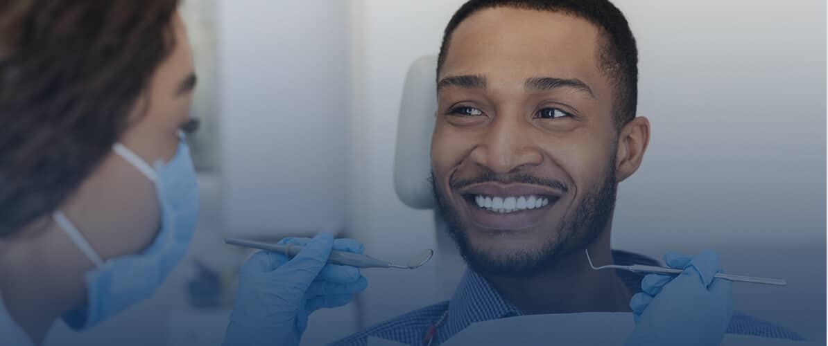 african american man at dentist